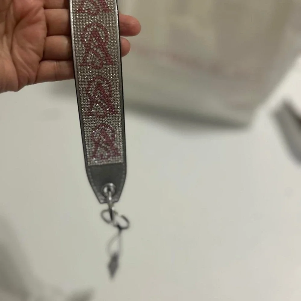 Victoria's Secret pink & silver rhinestone keychain with repeating V-shaped